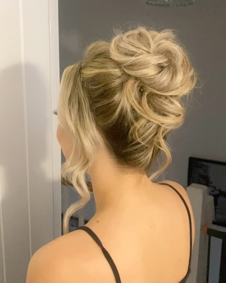 Tousled bridal updo styling